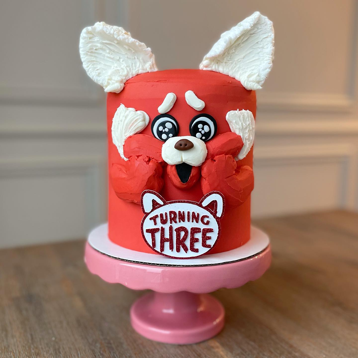Cake with a Flair: Red Panda Design for Your Celebration